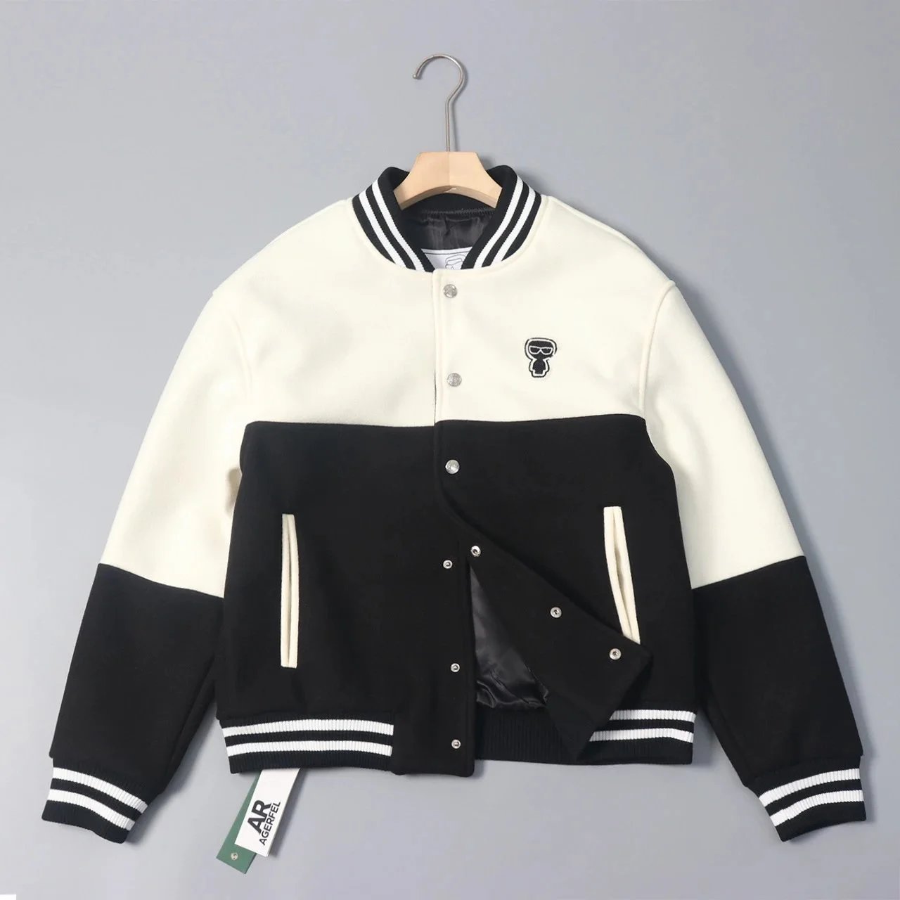 Classic Black and White Varsity Jacket with Skull Logo