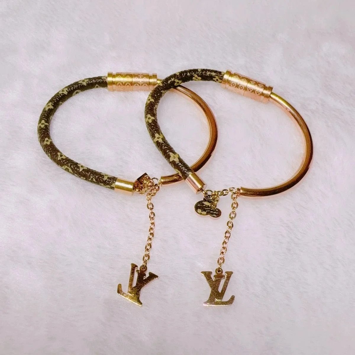 Louis Vuitton Monogram Bracelet with LV Charm Gold Tone Jewelry