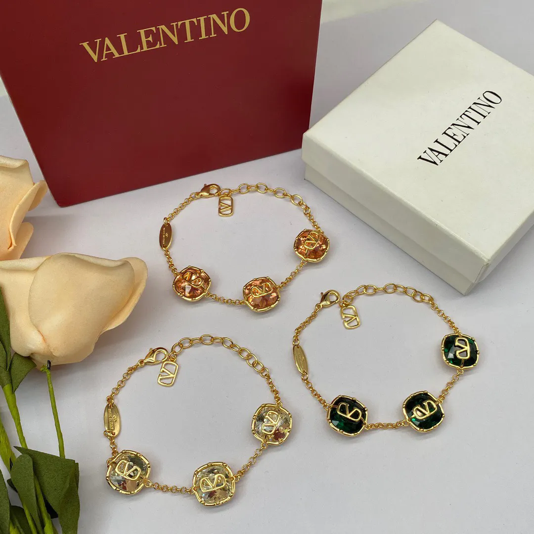 Valentino Gold Tone Crystal Bracelets with V Logo Charm