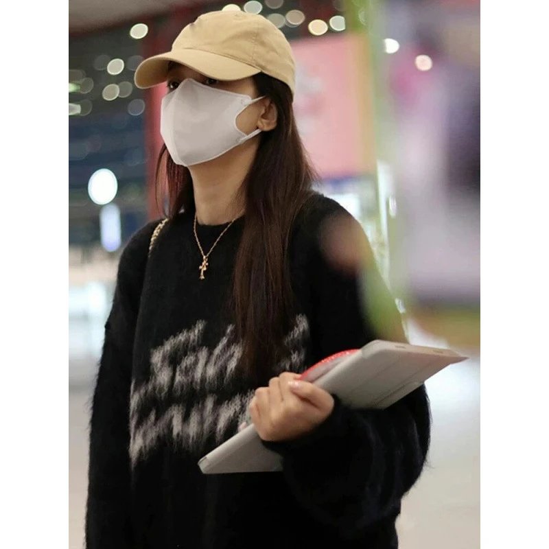 Stylish Black Knit Sweater with Graphic Print for Women
